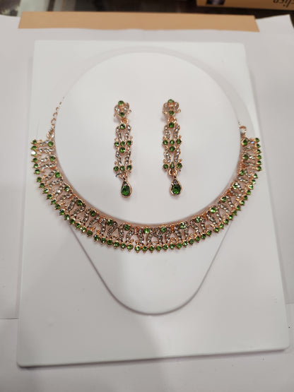 Elegant green and white rhinestone necklace set with floral drop earrings, perfect for weddings and parties.